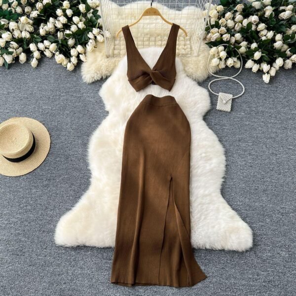 A Two-piece Knitted Vest With A Slimming, Body-hugging, Slit Skirt