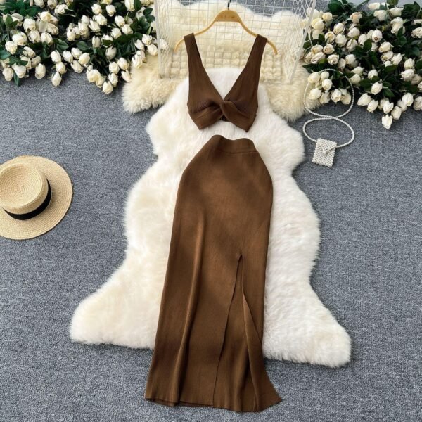 A Two-piece Knitted Vest With A Slimming, Body-hugging, Slit Skirt
