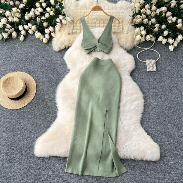 A Two-piece Knitted Vest With A Slimming, Body-hugging, Slit Skirt