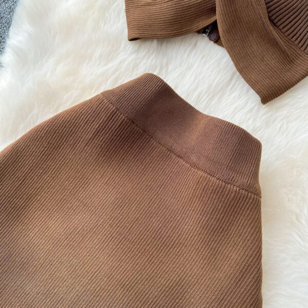 A Two-piece Knitted Vest With A Slimming, Body-hugging, Slit Skirt